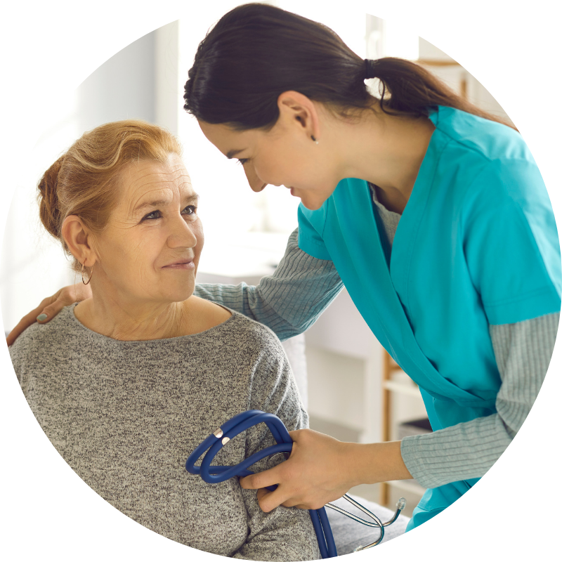 PMHNP Nurse talking with a patient with holding a stethoscope 