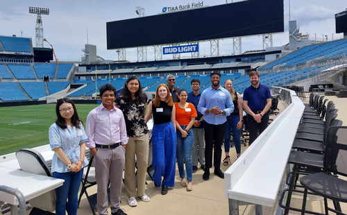 Students with the Florida Data Science for Social Good program at TIAA Bank Field.