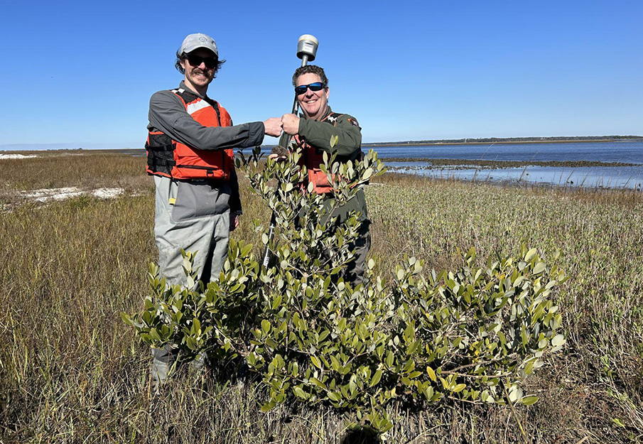 Scott Jones (left) Ches Vervaeke (right) with northernmost mangrove