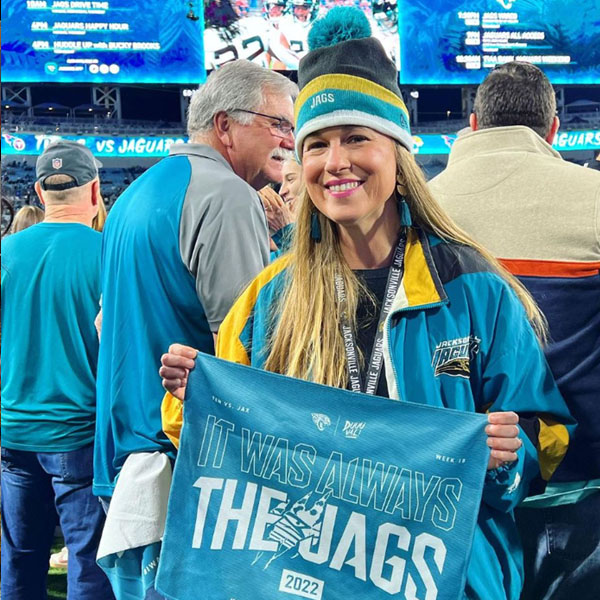 caron in her jags gear at a game